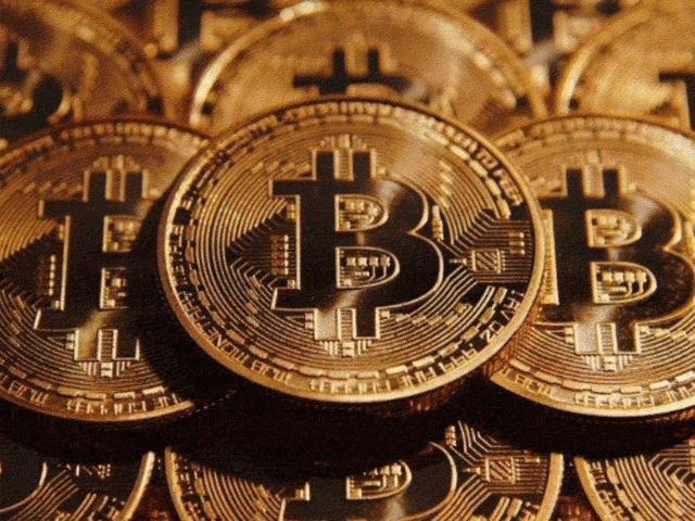 Bitcoin's market value exceeds $1tn after price soars | Bitcoin | The Guardian