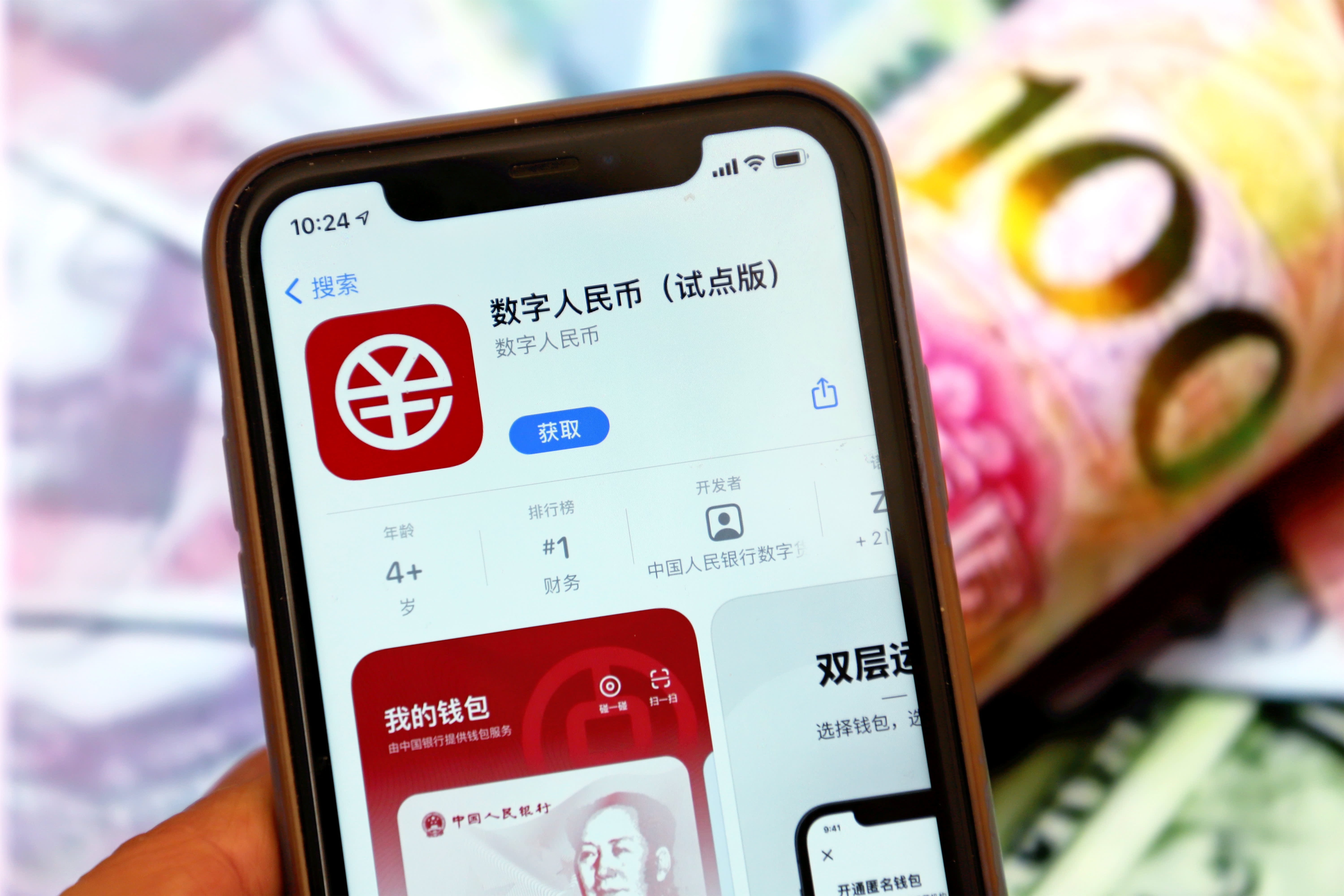 China central bank launches digital yuan wallet apps for Android, iOS | Reuters