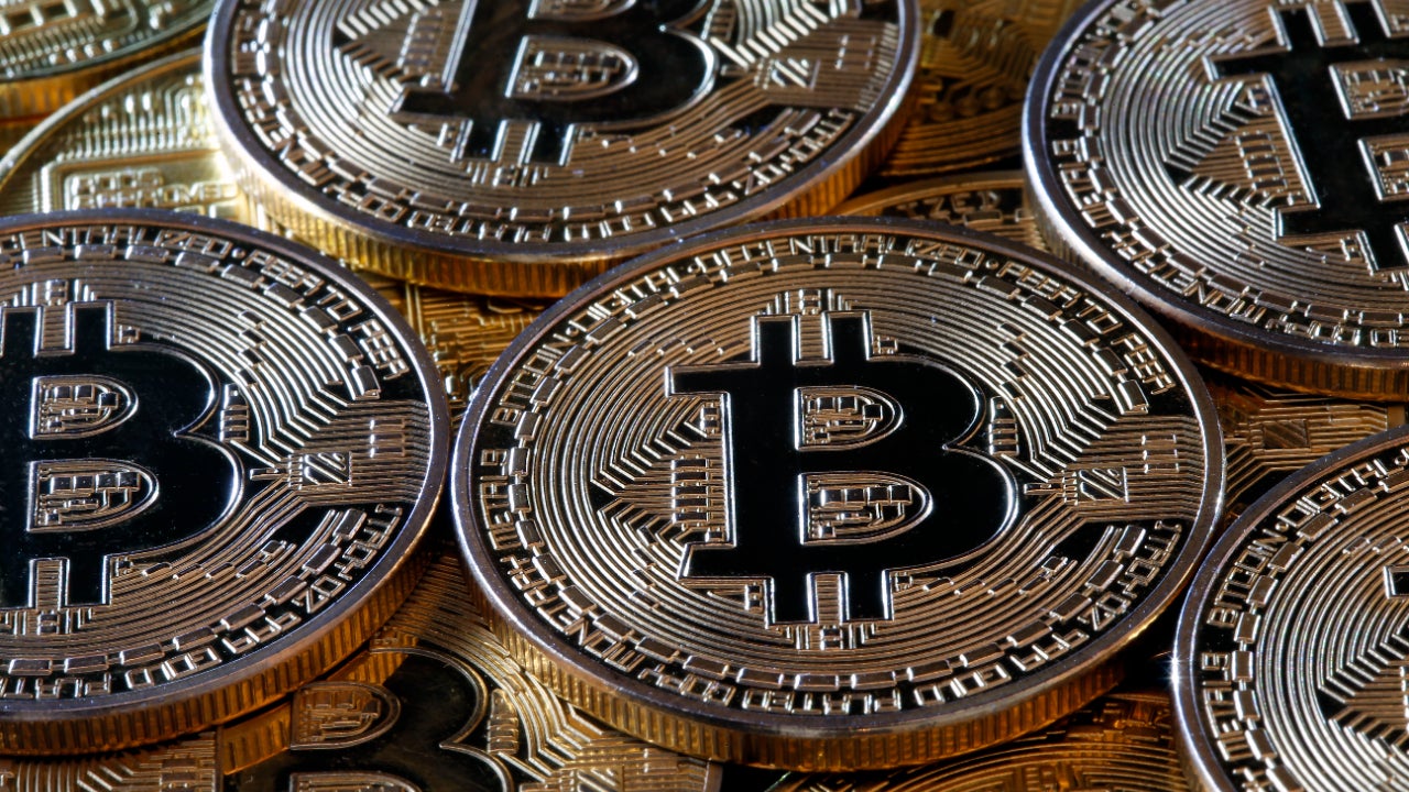 Instant view: Bitcoin rises to record high | Reuters