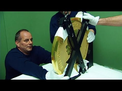 Berlin police raid homes and shops over theft of kg gold coin | Germany | The Guardian