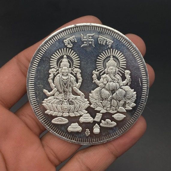 silver coins, ganesh coin, laxmi coin, gold coins,